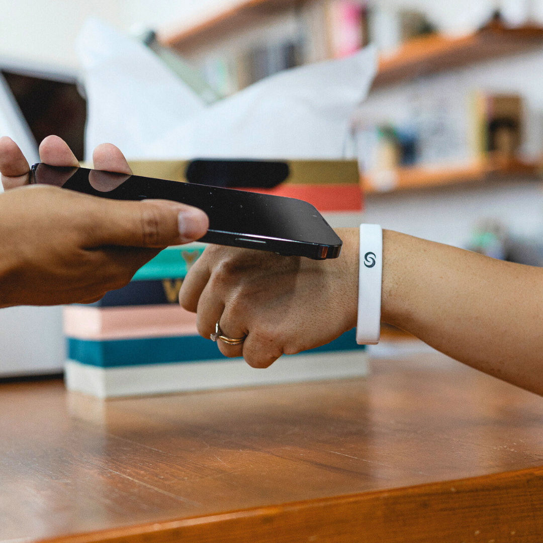 White NFC Wristband phone tap
