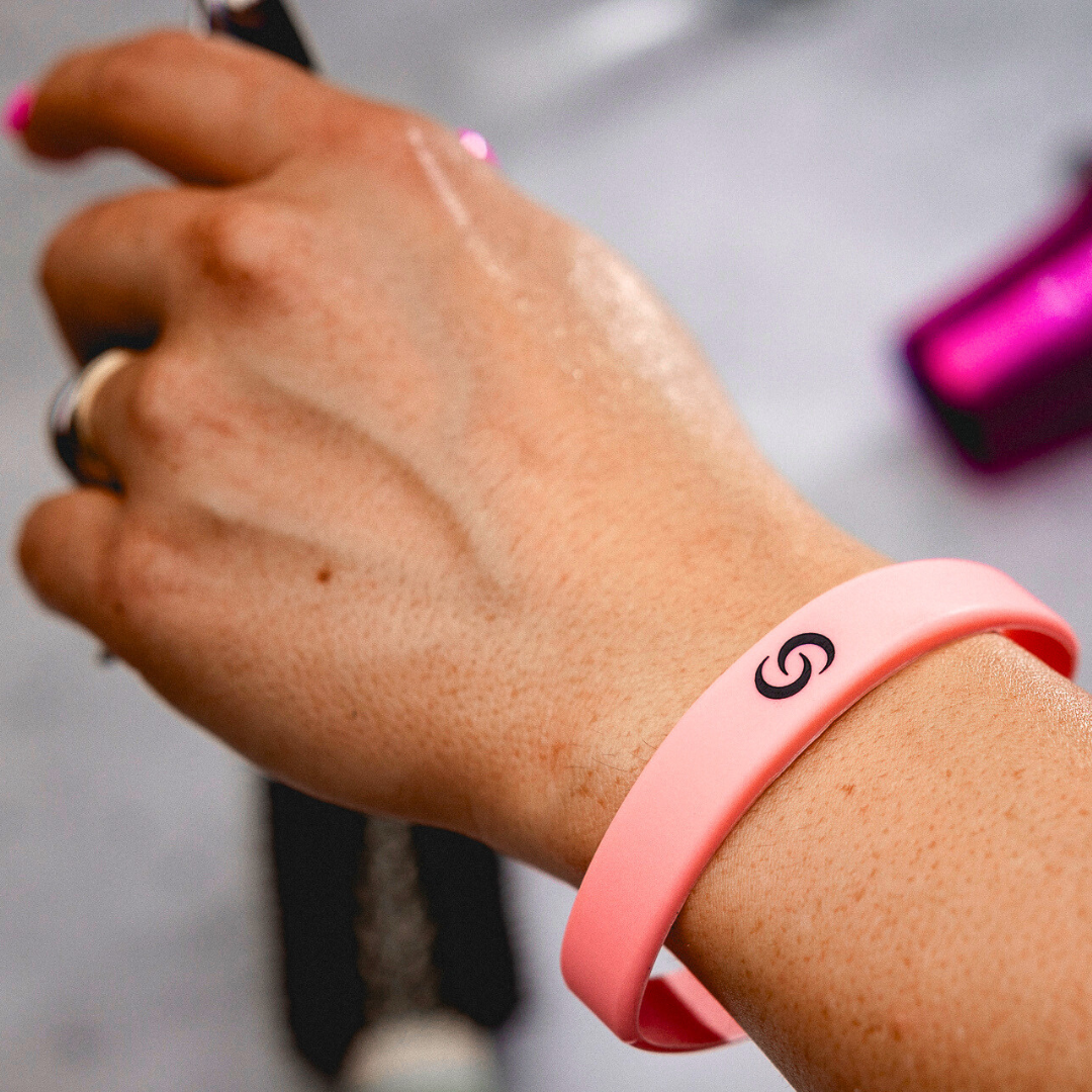 Pink NFC Wristband on hand